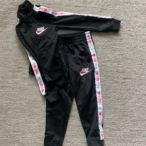 Nike girls black with pink detail track suit